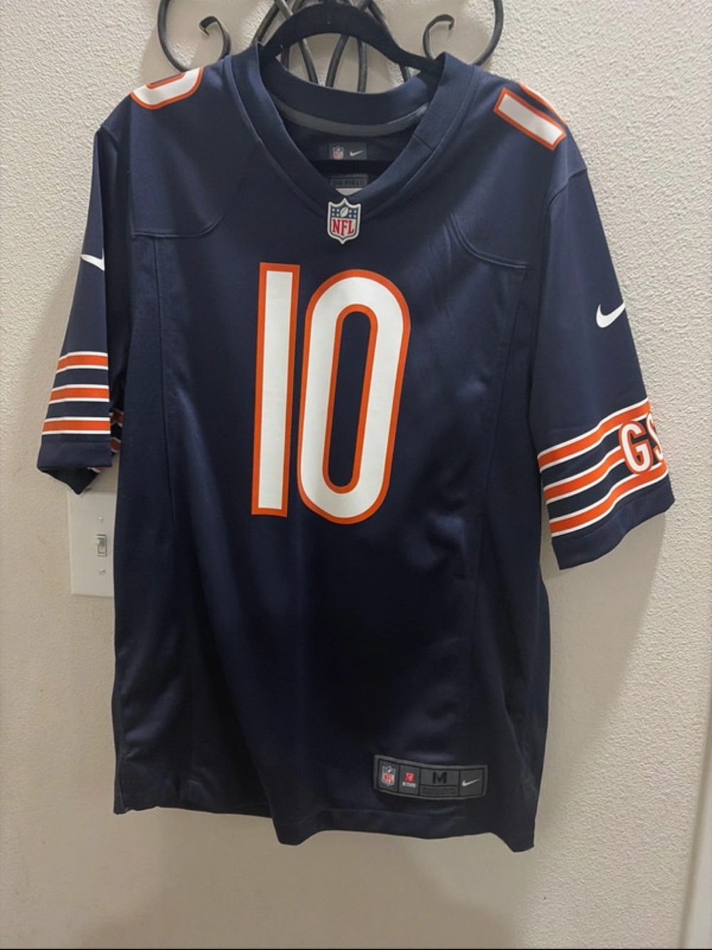 Nike Men’s Navy Football Jersey with Orange and White Accents #10
